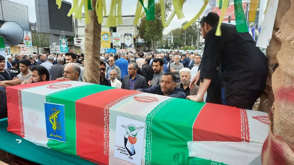 پیکر جانباز 70 درصد آملی در کنار همرزمان شهیدش آرام گرفت